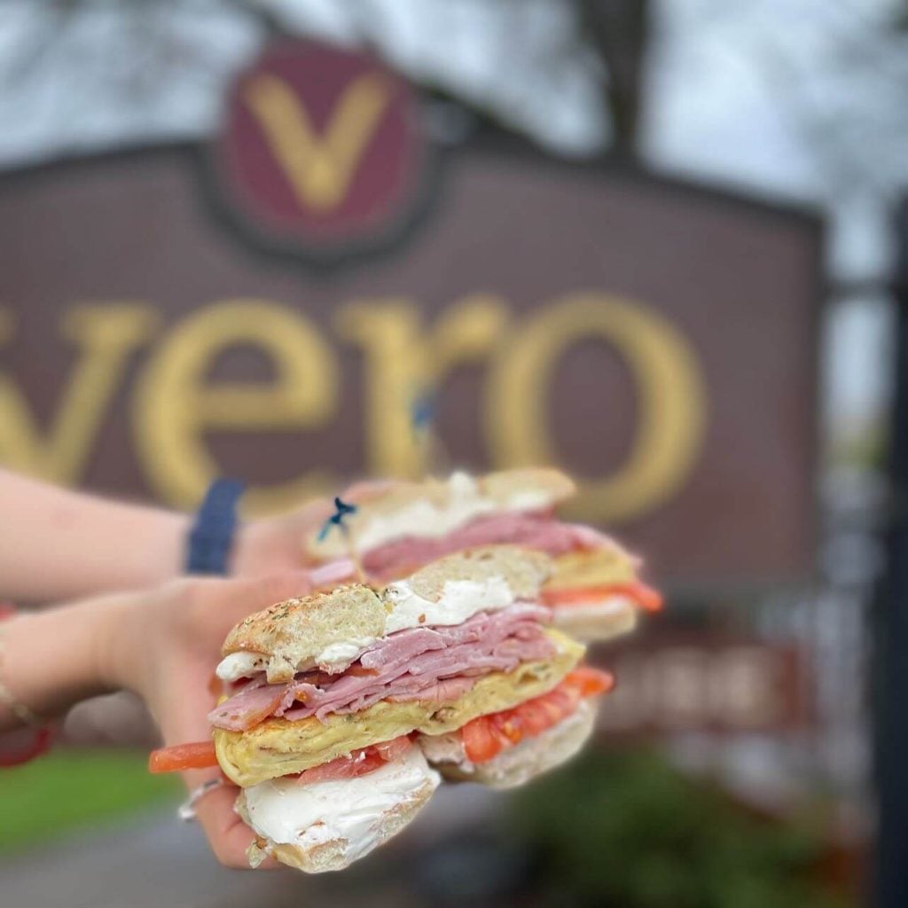 hands hold a sandwich at vero espresso